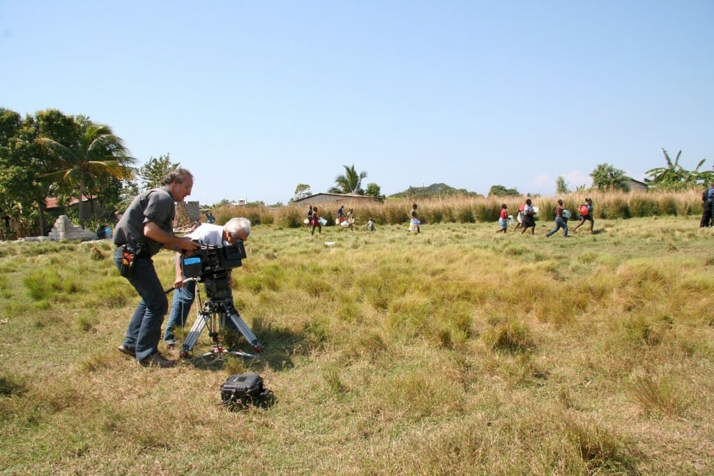 Filming a water delivery.